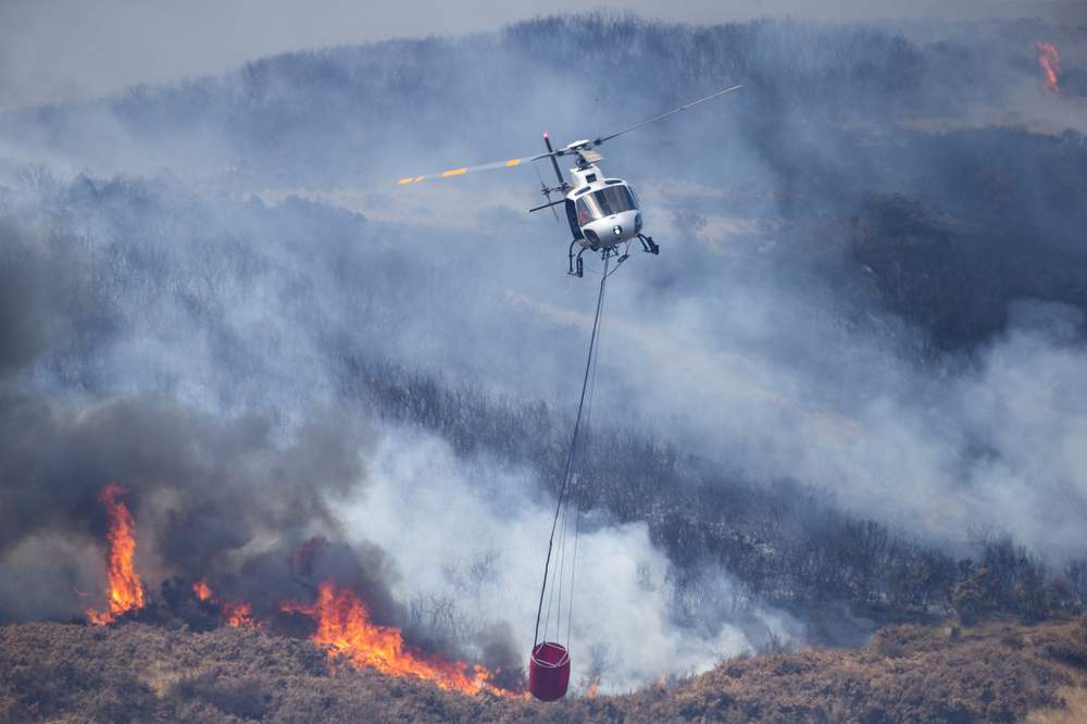 The big difference on day two was that fire bosses had 11 helicopters at their disposal.
PHOTO: JOSEPH JOHNSON/FAIRFAX NZ The big difference on day two was that fire bosses had 11 helicopters at their disposal.
PHOTO: JOSEPH JOHNSON/FAIRFAX NZ