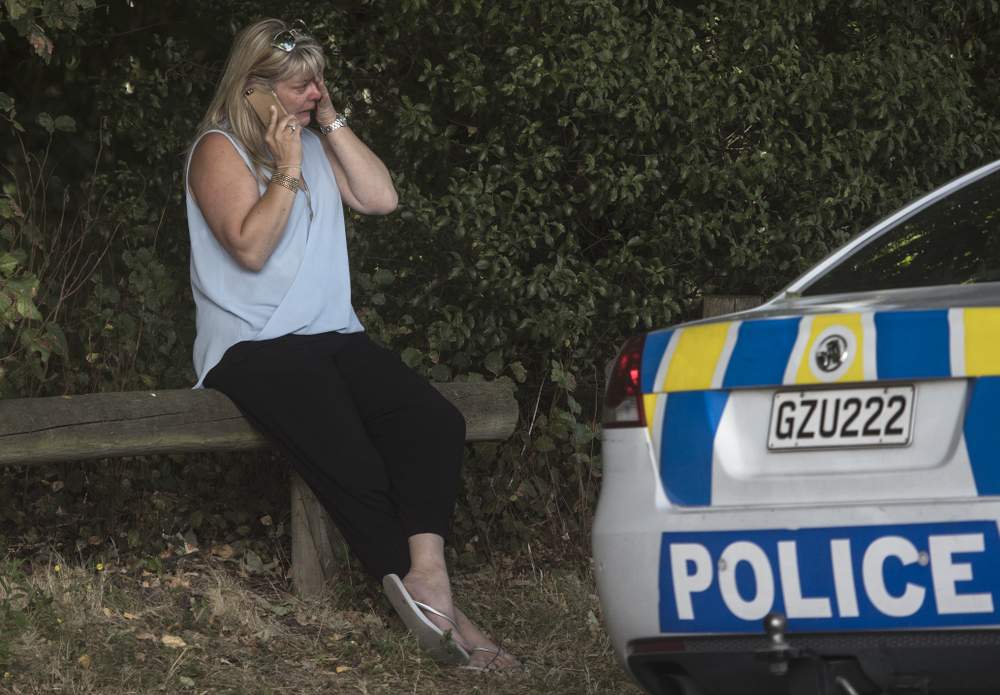 Miranda Newbury in tears at the cordon after fleeing her home.  PHOTO: IAIN McGREGOR\/FAIRFAX NZ Miranda Newbury in tears at the cordon after fleeing her home.  PHOTO: IAIN McGREGOR\/FAIRFAX NZ