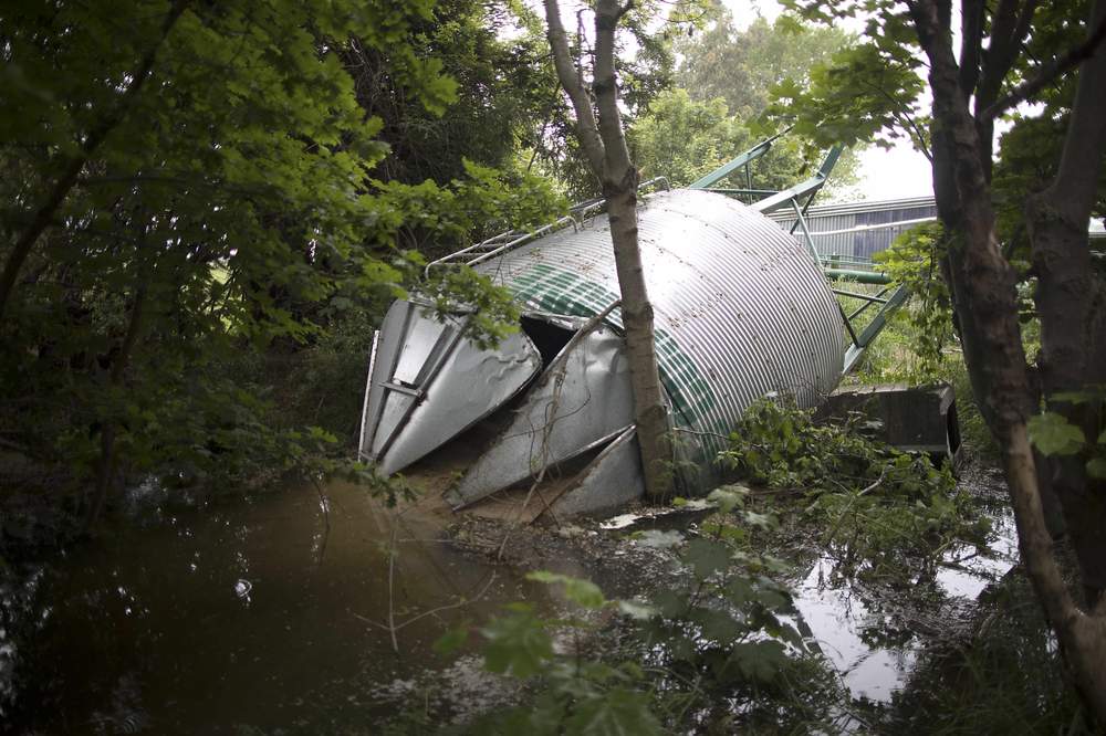 A tank on Graham Collins&#39; farm downed by the quake. (LAWRENCE SMITH\/FAIRFAX NZ)